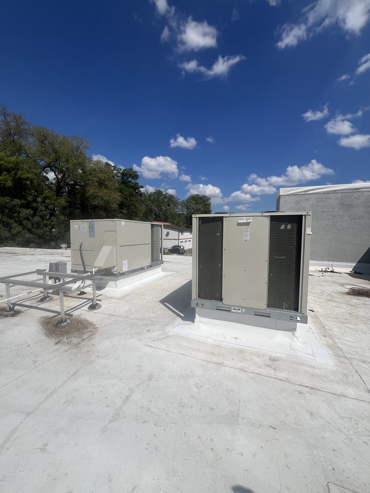 Commercial rooftop curb and equipment mounting by Coastal Living Construction